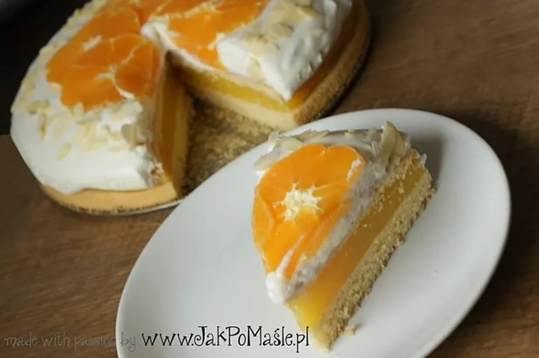 Tort pomarańczowy na biszkopcie - przepis